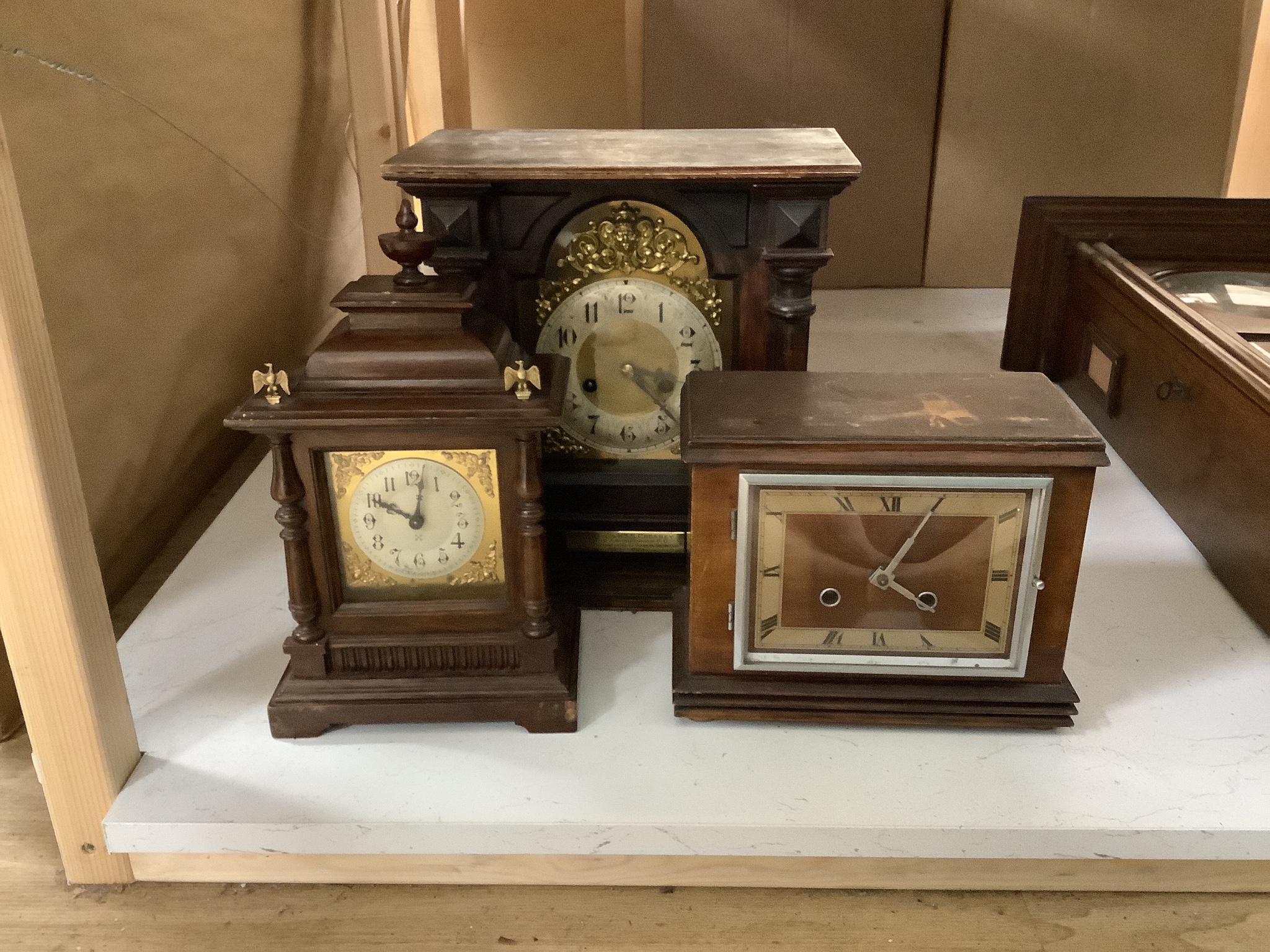 Three early 20th century German walnut mantel clocks